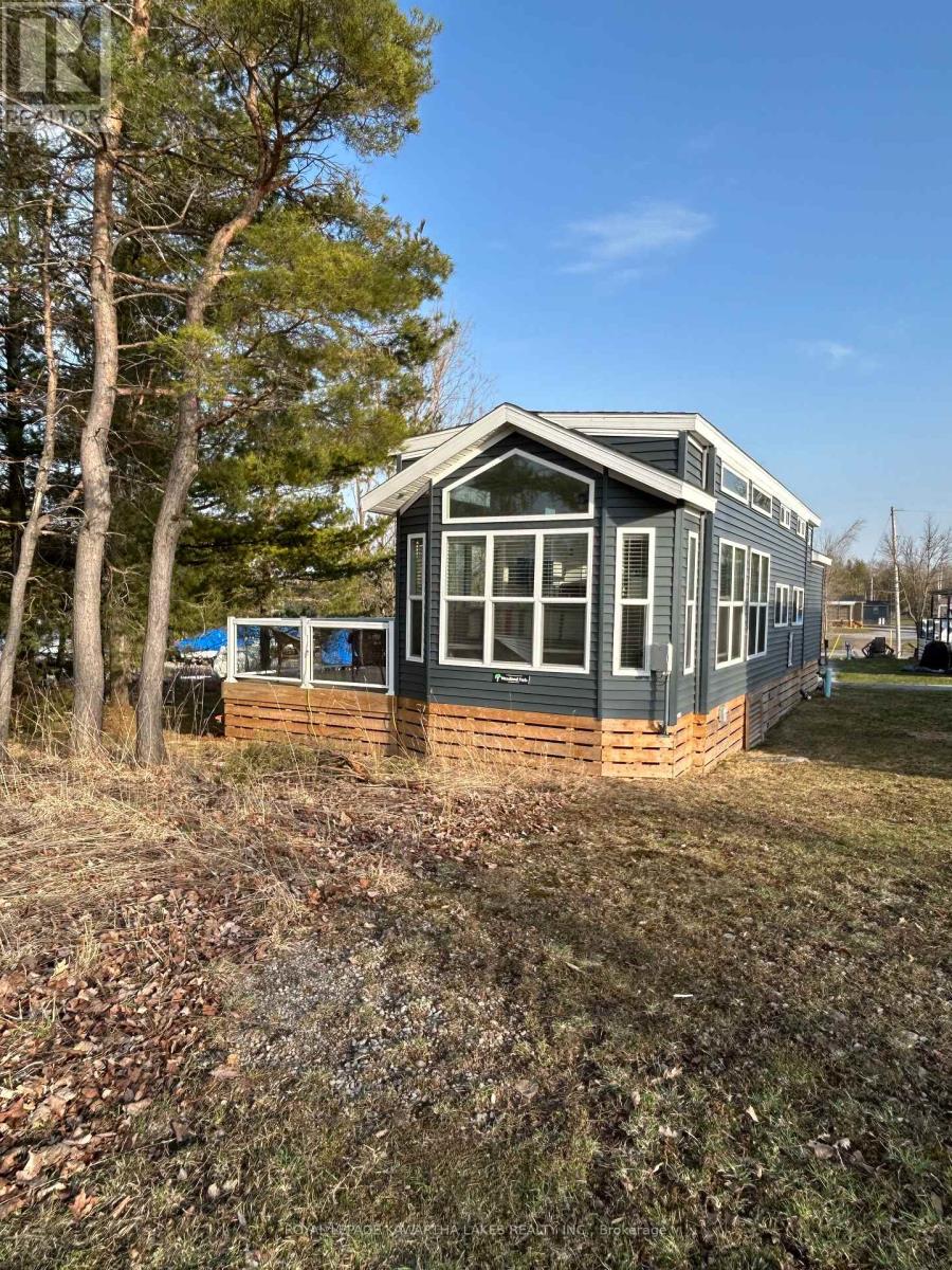 <div class="slider-price">$149,900</div><p>Cv082 - 657 Thunder Bridge Road, Kawartha Lakes, Ontario</p>
