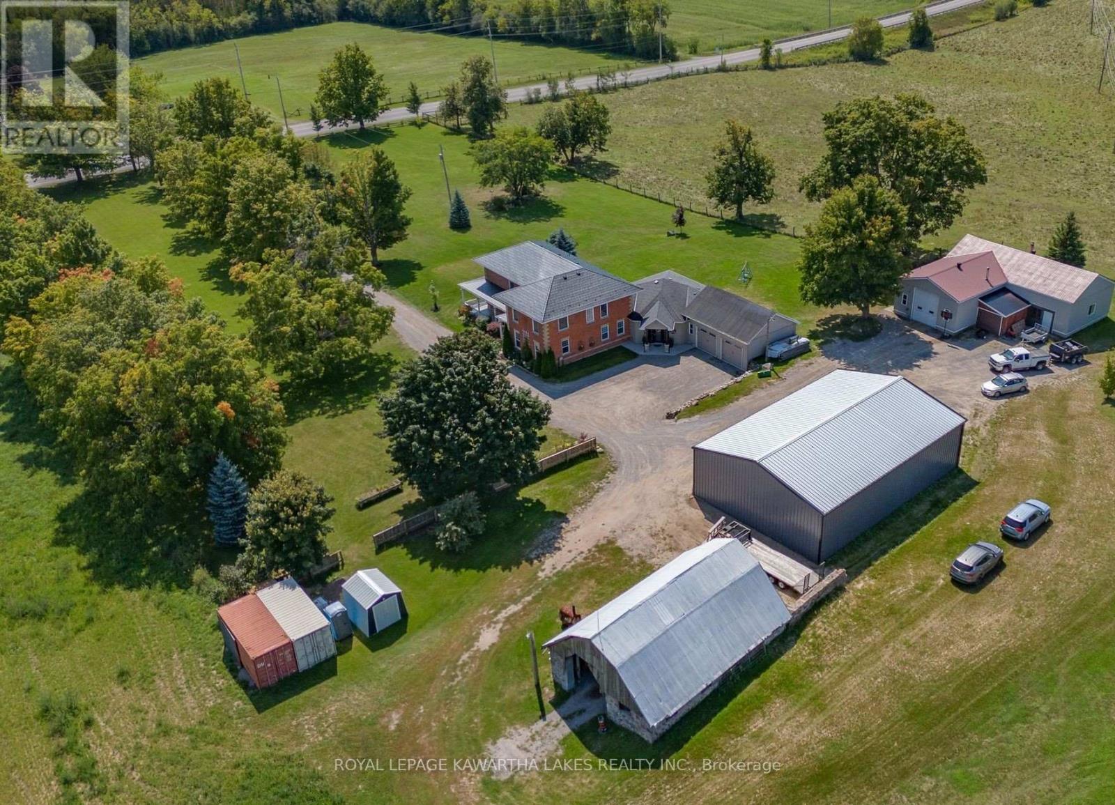 <div class="slider-price">$1,950,000</div><p>542 Lily Lake Road, Selwyn, Ontario</p>