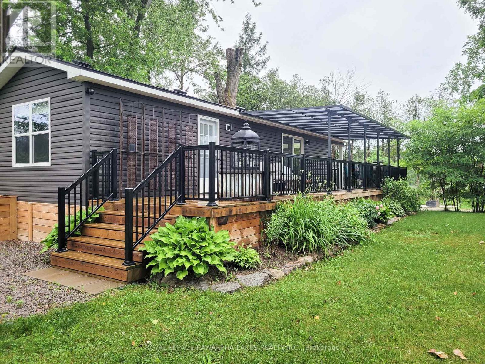 <div class="slider-price">$148,900</div><p>Wv19 - 657 Thunder Bridge Road, Kawartha Lakes, Ontario</p>