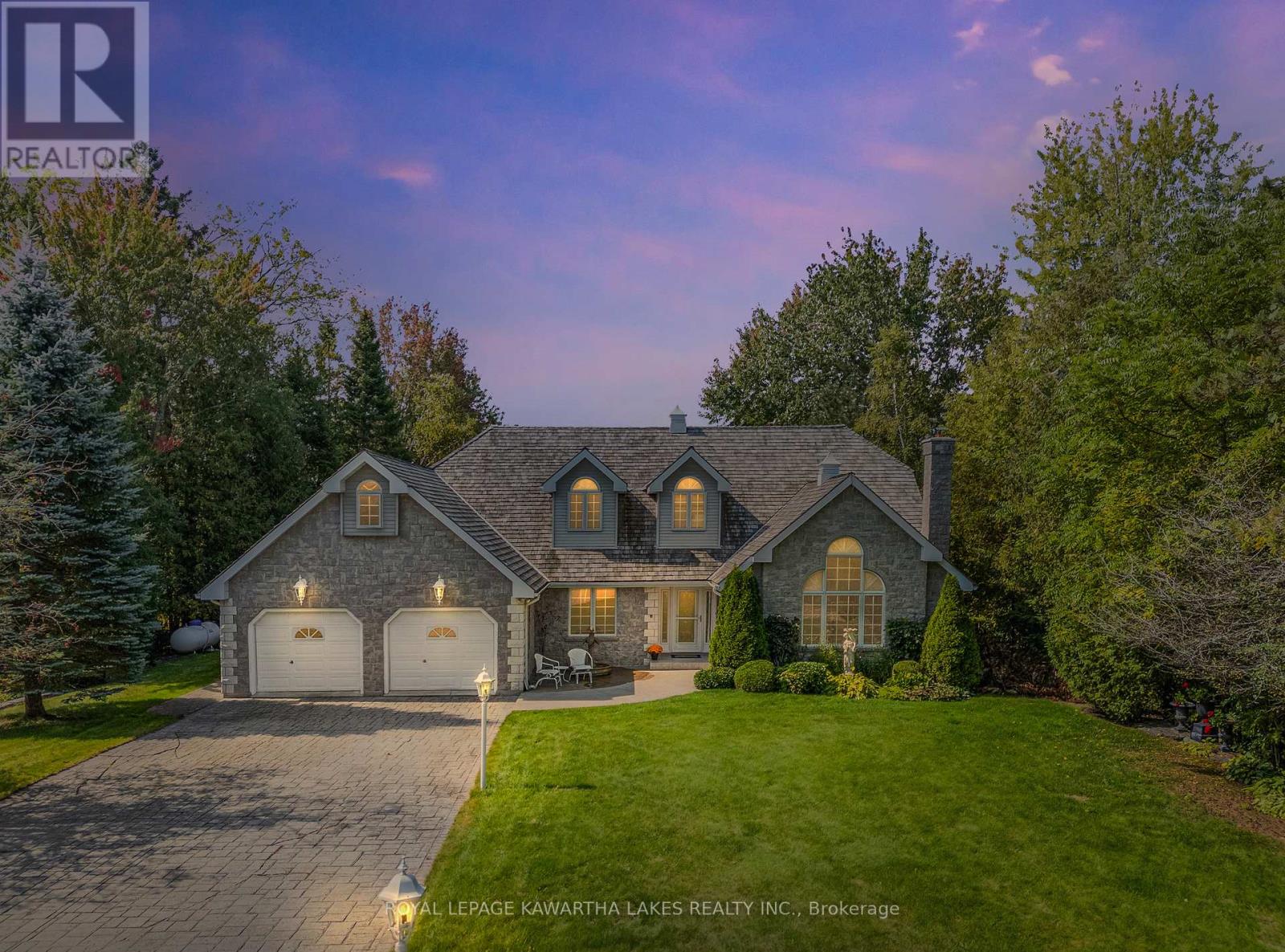 <div class="slider-price">$1,799,000</div><p>4 Sturgeon Glen Road, Kawartha Lakes, Ontario</p>