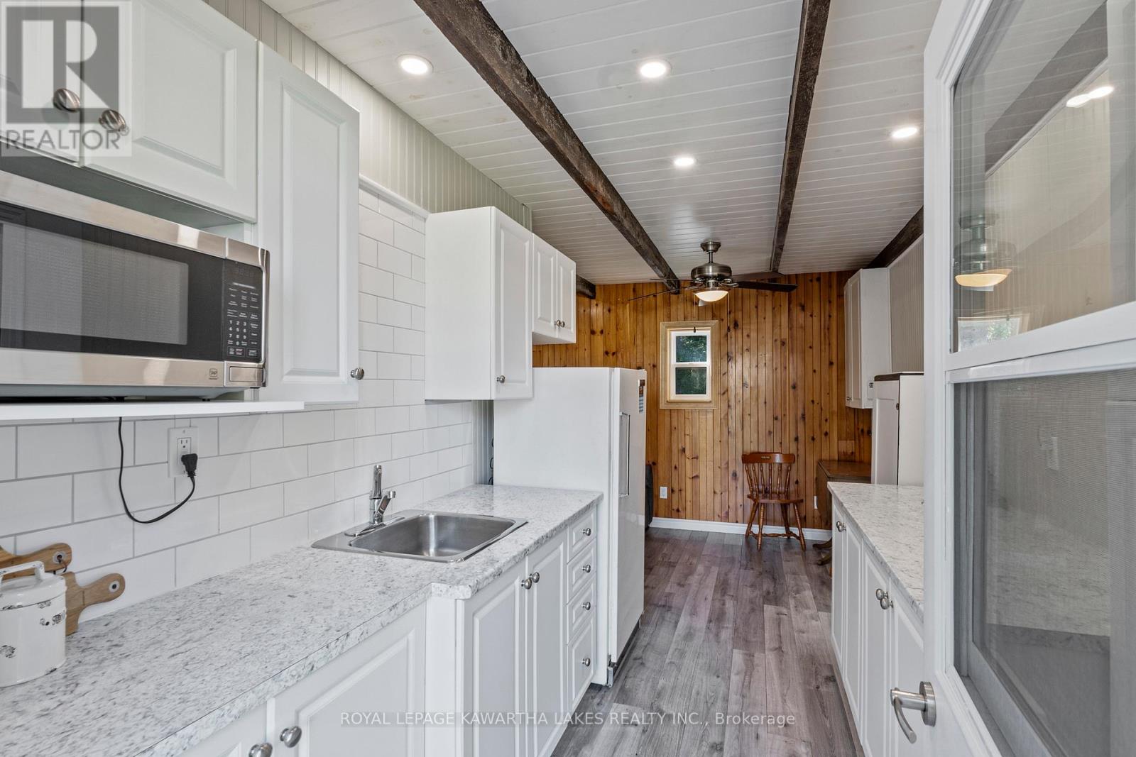 404 Balsam Lake Drive, Kawartha Lakes, Ontario  K0M 2B0 - Photo 11 - X12138681